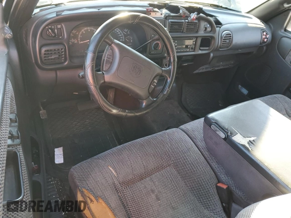 1999 Dodge 1500 with VIN 3B7HC12Y8XG208040, listed as a Copart auction lot 86807104 with 387,576 mi miles and Salvage Title. Bid and sale history available at DreamBid. Image 8.