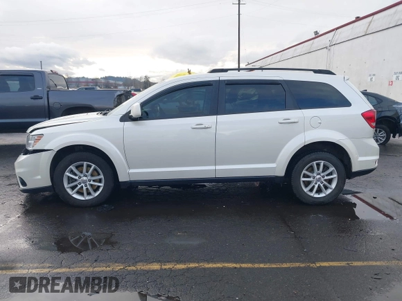 2014 Dodge Journey SXT with VIN 3C4PDCBGXET182430, listed as a IAAI auction lot 41599489 with 143,889 mi miles. Bid and sale history available at carsss.com. Image 14.
