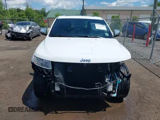 2014 Jeep Grand Cherokee Limited with VIN 1C4RJFBG3EC350648, listed as a IAAI auction lot 42523221 with 125,447 mi miles and . Bid and sale history available at DreamBid. Image 13.