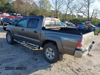 2014 Toyota Tacoma with VIN 3TMLU4EN3EM163162, listed as a IAAI auction lot 41930392 with 167,368 mi miles and . Bid and sale history available at DreamBid. Image 3.