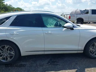 2025 Genesis GV70 2.5T with VIN KMUMADTB8SU213077, listed as a IAAI auction lot 42642854 with 13,762 mi miles and . Bid and sale history available at DreamBid. Image 12.