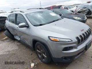 2016 Jeep Cherokee Latitude with VIN 1C4PJLCB5GW369955, listed as a IAAI auction lot 41297796 with 99,029 mi miles. Bid and sale history available at carsss.com. Image 1.