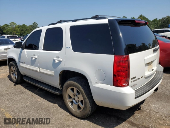 2009 GMC Yukon SLT w/4SA with VIN 1GKEC33309R214195, listed as a Copart auction lot 61430404 with 174,776 mi miles and Salvage Title. Bid and sale history available at carsss.com. Image 2.