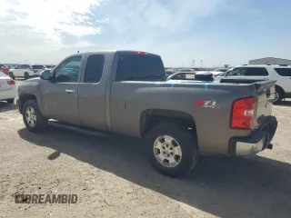 2011 Chevrolet Silverado 1500 LT with VIN 1GCRKSE33BZ332402, listed as a Copart auction lot 48675245 with 128,322 mi miles and Salvage Title. Bid and sale history available at DreamBid. Image 2.