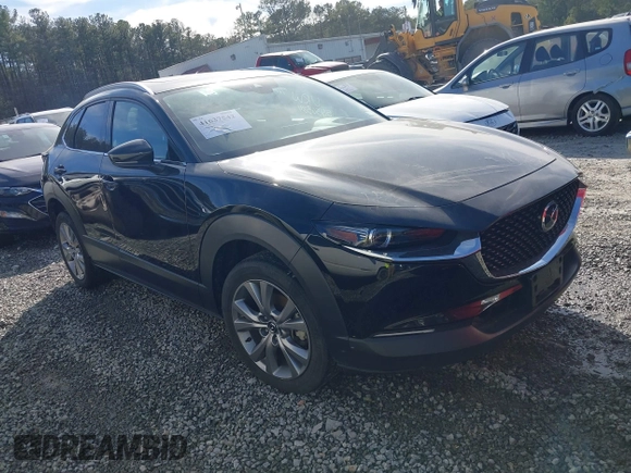 2023 Mazda CX-30 S Premium with VIN 3MVDMBDM7PM528297, listed as a IAAI auction lot 41637542 with 48,935 mi miles and . Bid and sale history available at DreamBid. Image 1.