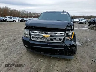 2014 Chevrolet Suburban LT with VIN 1GNSCJE01ER222961, listed as a Copart auction lot 84841744 with 168,131 mi miles and Salvage title. Bid and sale history available at DreamBid. Image 11.