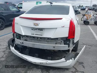 2018 Cadillac ATS RWD z VIN 1G6AA5RX2J0116853, wystawiony jako IAAI lot #41731111 z przebiegiem 91 135 mil mil oraz . Historia ofert i sprzedaży dostępna na DreamBid. Obrazek 17.