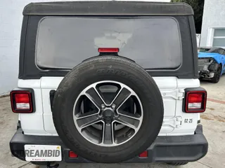 2023 Jeep Wrangler Sahara with VIN 1C4HJXENXPW586579, listed as a IAAI auction lot 41795621 with 34,433 mi miles. Bid and sale history available at carsss.com. Image 12.
