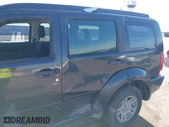 2011 Dodge Nitro SE z VIN 1D4PT2GK7BW520224, wystawiony jako IAAI lot #41781346 z przebiegiem 152 140 mil mil oraz . Historia ofert i sprzedaży dostępna na DreamBid. Obrazek 6.