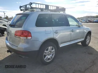 2004 Volkswagen Touareg with VIN WVGEM77LX4D071560, listed as a Copart auction lot 41630995 with 168,906 mi miles and Salvage title. Bid and sale history available at DreamBid. Image 3.