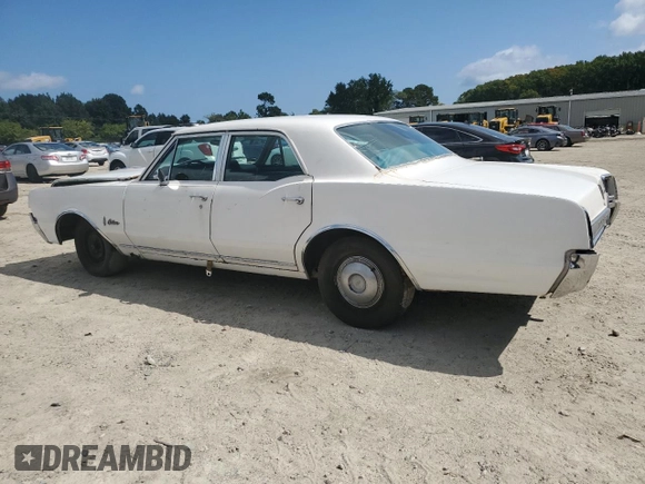 1967 Oldsmobile Cutlass with VIN 336697G151477, listed as a Copart auction lot 71653824 with 974,235 mi miles and Clean Title. Bid and sale history available at DreamBid. Image 2.