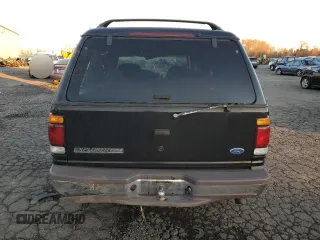 1997 Ford Explorer XL with VIN 1FMDU34E8VUC95969, listed as a Copart auction lot 83269784 with 174,035 mi miles and Salvage title. Bid and sale history available at DreamBid. Image 6.