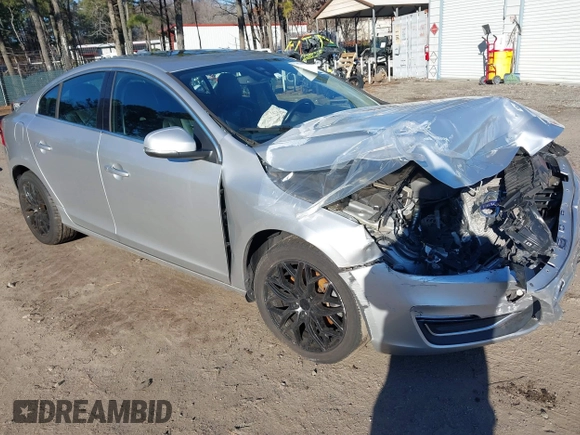 2016 Volvo S60 T5 Drive-E Premier z VIN YV126MFKXG1395519, wystawiony jako IAAI lot #41488969 z przebiegiem 109 130 mil mil oraz . Historia ofert i sprzedaży dostępna na DreamBid. Obrazek 1.