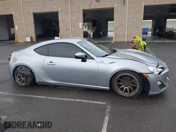 2016 Scion FR-S with VIN JF1ZNAA1XG8709798, listed as a IAAI auction lot 41713314 with 139,450 mi miles. Bid and sale history available at carsss.com. Image 14.
