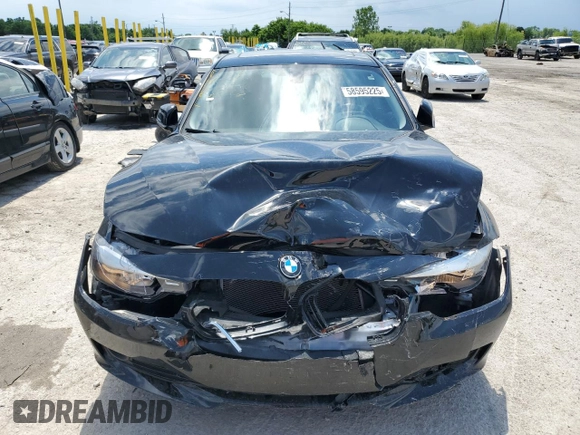 2014 BMW 3 Series 320i xDrive with VIN WBA3C3G51ENS72023, listed as a Copart auction lot 58595225 with 104,315 mi miles and Salvage title. Bid and sale history available at DreamBid. Image 5.