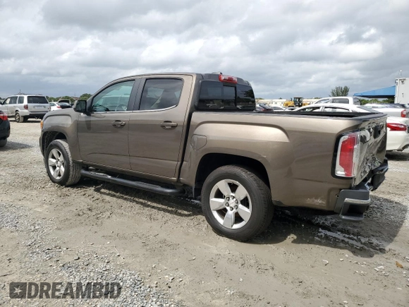 2015 GMC Canyon 4WD SLE with VIN 1GTG6BE38F1263139, listed as a Copart auction lot 75479854 with 124,765 mi miles and Salvage Title. Bid and sale history available at carsss.com. Image 2.