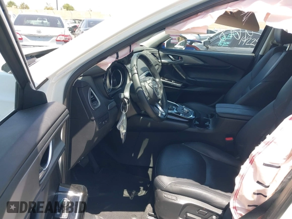 2023 Mazda CX-9 Touring Plus with VIN JM3TCBAY7P0636047, listed as a IAAI auction lot 42309618 with 20,821 mi miles and . Bid and sale history available at DreamBid. Image 5.