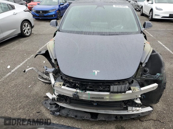 2019 Tesla Model 3 Mid Range with VIN 5YJ3E1EA9KF447453, listed as a Copart auction lot 48967605 with 72,031 mi miles and Salvage Title. Bid and sale history available at DreamBid. Image 5.
