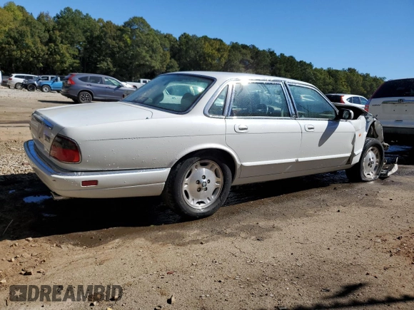 1996 Jaguar XJ with VIN SAJHX1747TC767829, listed as a Copart auction lot 76677444 with Not provided miles and Salvage title. Bid and sale history available at DreamBid. Image 3.