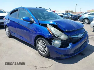 2014 Hyundai Accent GLS with VIN KMHCT4AE0EU655857, listed as a IAAI auction lot 41987827 with 172,535 mi miles. Bid and sale history available at carsss.com. Image 1.