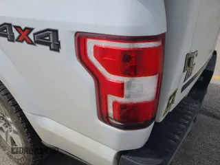 2019 Ford F-150 XL with VIN 1FTFX1E45KKC43673, listed as a IAAI auction lot 42663601 with 176,909 mi miles and . Bid and sale history available at DreamBid. Image 1.