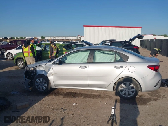 2023 Kia Rio S z VIN 3KPA24AD2PE545609, wystawiony jako IAAI lot #41993823 z przebiegiem 12 186 mil mil oraz . Historia ofert i sprzedaży dostępna na DreamBid. Obrazek 14.