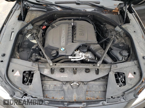 2013 BMW 7 Series 740Li with VIN WBAYE4C51DD137687, listed as a Copart auction lot 76103944 with 134,609 mi miles and Salvage title. Bid and sale history available at DreamBid. Image 11.