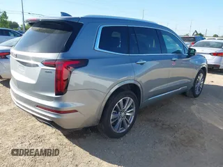 2025 Cadillac XT6 FWD Premium Luxury with VIN 1GYKPCRS3SZ118384, listed as a IAAI auction lot 41962391 with 6,946 mi miles. Bid and sale history available at carsss.com. Image 4.