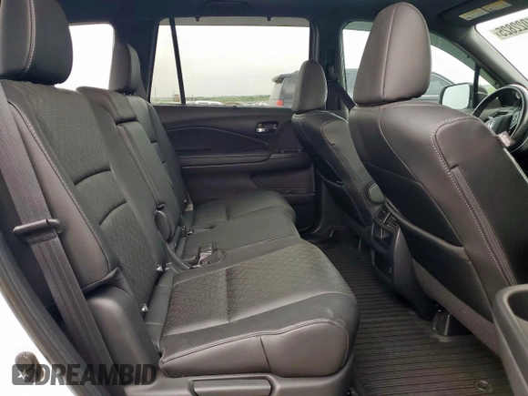 2020 Honda Passport EX-L with VIN 5FNYF7H57LB002957, listed as a Copart auction lot 51022825 with 74,868 mi miles and Salvage Title. Bid and sale history available at DreamBid. Image 11.