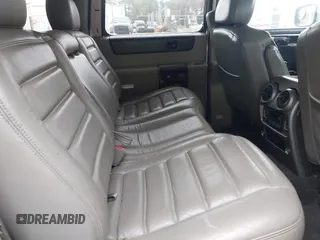 2003 Hummer H2 with VIN 5GRGN23U73H142389, listed as a IAAI auction lot 42219627 with 78,547 mi miles. Bid and sale history available at carsss.com. Image 8.