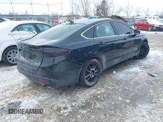 2013 Ford Fusion SE Hybrid with VIN 3FA6P0LU0DR176353, listed as a IAAI auction lot 41591238 with 190,717 mi miles. Bid and sale history available at carsss.com. Image 4.