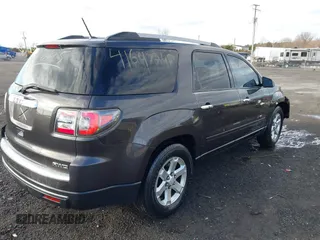 2014 GMC Acadia SLE with VIN 1GKKVPKD6EJ159470, listed as a IAAI auction lot 41697245 with 163,492 mi miles and . Bid and sale history available at carsss.com. Image 4.