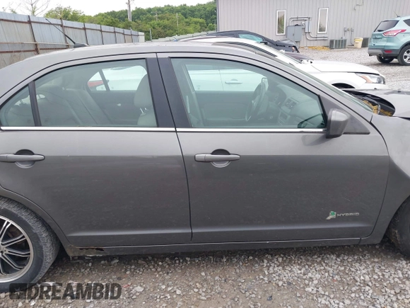 2011 Ford Fusion Hybrid with VIN 3FADP0L39BR345250, listed as a IAAI auction lot 42319401 with 321,317 mi miles and . Bid and sale history available at DreamBid. Image 14.