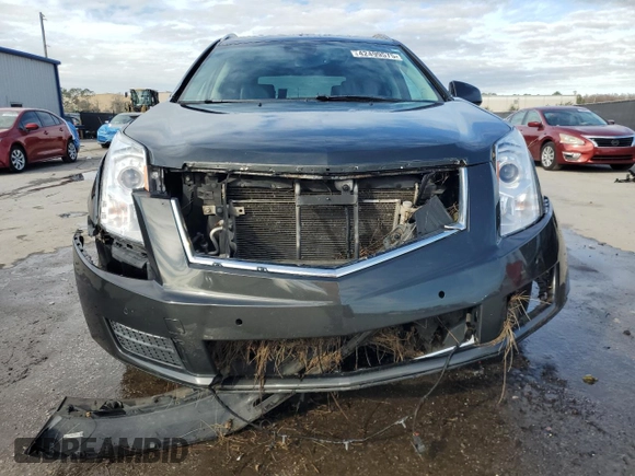 2014 Cadillac SRX Luxury Collection with VIN 3GYFNBE31ES561151, listed as a Copart auction lot 42499575 with 140,677 mi miles and Salvage Title. Bid and sale history available at carsss.com. Image 5.