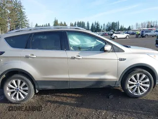 2017 Ford Escape Titanium with VIN 1FMCU0JD0HUB79739, listed as a IAAI auction lot 41807975 with 121,902 mi miles. Bid and sale history available at carsss.com. Image 13.