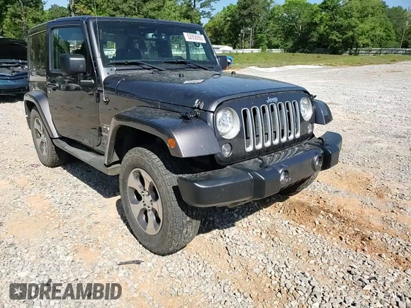 2017 Jeep Wrangler Sahara z VIN 1C4AJWBG1HL669600, wystawiony jako Copart lot #52856865 z przebiegiem 85 311 mil mil oraz Szkoda całkowita • Salvage title. Historia ofert i sprzedaży dostępna na DreamBid. Obrazek 11.