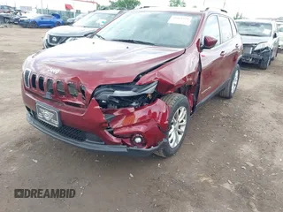 2019 Jeep Cherokee Latitude with VIN 1C4PJMCB5KD386572, listed as a IAAI auction lot 42364321 with 133,854 mi miles and . Bid and sale history available at DreamBid. Image 6.