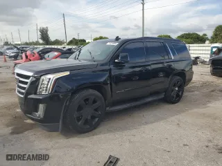 2016 Cadillac Escalade Luxury Collection with VIN 1GYS4BKJ6GR159233, listed as a Copart auction lot 71221884 with 100,846 mi miles and Salvage Title. Bid and sale history available at carsss.com. Image 1.
