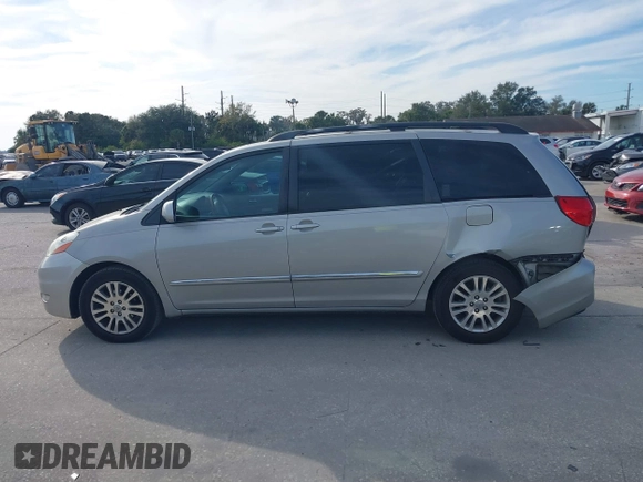 2008 Toyota Sienna XLE with VIN 5TDZK22C18S161339, listed as a IAAI auction lot 41449450 with 202,512 mi miles. Bid and sale history available at carsss.com. Image 14.