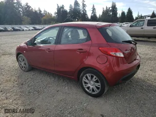 2014 Mazda Mazda2 Sport with VIN JM1DE1KZ9E0186729, listed as a Copart auction lot 73205454 with 123,050 mi miles and Salvage Title. Bid and sale history available at carsss.com. Image 2.