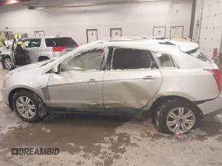 2016 Cadillac SRX Luxury Collection z VIN 3GYFNBE36GS572780, wystawiony jako IAAI lot #41347399 z przebiegiem 166 436 mil mil oraz . Historia ofert i sprzedaży dostępna na DreamBid. Obrazek 14.