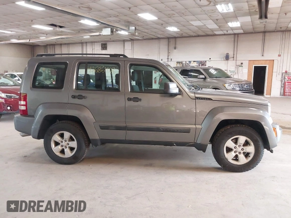 2012 Jeep Liberty Sport with VIN 1C4PJMAK1CW209462, listed as a IAAI auction lot 42686418 with 157,595 mi miles and . Bid and sale history available at DreamBid. Image 14.