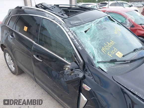 2016 Cadillac SRX Luxury Collection with VIN 3GYFNEE39GS570748, listed as a IAAI auction lot 42255564 with 130,980 mi miles and . Bid and sale history available at DreamBid. Image 6.