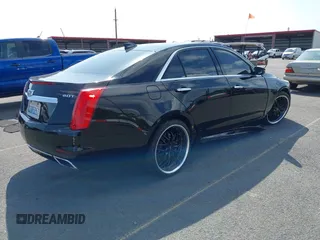 2016 Cadillac CTS Sedan Luxury Collection RWD with VIN 1G6AR5SX8G0167026, listed as a IAAI auction lot 41526996 with 76,612 mi miles. Bid and sale history available at carsss.com. Image 4.