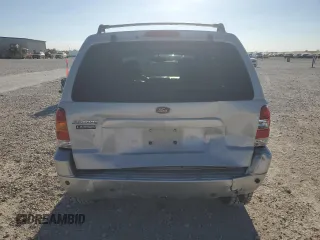 2004 Ford Escape Limited with VIN 1FMCU041X4KA45604, listed as a Copart auction lot 80974334 with 88,687 mi miles and Salvage title. Bid and sale history available at DreamBid. Image 6.