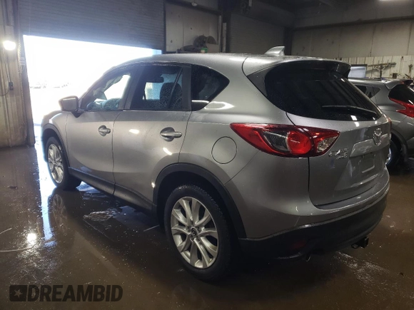 2015 Mazda CX-5 Grand Touring with VIN JM3KE4DY5F0456142, listed as a Copart auction lot 49353845 with 193,512 mi miles and Salvage Title. Bid and sale history available at carsss.com. Image 2.