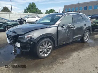2020 Mazda CX-9 Grand Touring z VIN JM3TCBDYXL0407433, wystawiony jako Copart lot #58617215 z przebiegiem 84 012 mil mil oraz Szkoda całkowita • Salvage title. Historia ofert i sprzedaży dostępna na DreamBid. Obrazek 1.