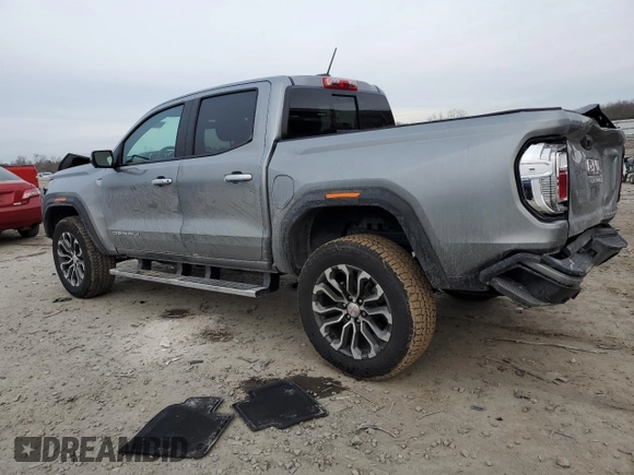 2024 GMC Canyon 4WD Denali with VIN 1GTP6FEKXR1248564, listed as a Copart auction lot 43116895 with 7,044 mi miles and Salvage Title. Bid and sale history available at carsss.com. Image 2.