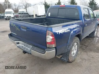 2014 Toyota Tacoma with VIN 3TMLU4EN0EM147243, listed as a IAAI auction lot 41684902 with 308,167 mi miles. Bid and sale history available at carsss.com. Image 4.