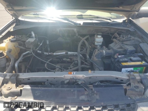 2007 Ford Escape XLS с VIN 1FMYU02Z17KA20500, выставлен на аукционе Copart как лот 59016055 с пробегом 215 936 миль миль и Списание • Salvage title. История ставок и продаж доступна на DreamBid. Изображение 12.